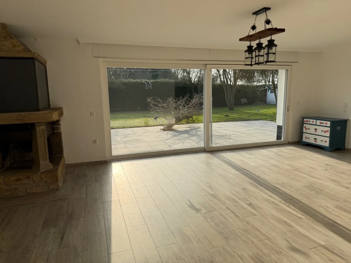 Wohnzimmer mit Kamin rechte DHH